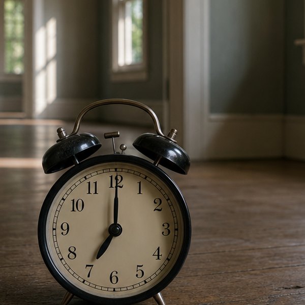 Empty house with blaring alarm clock — detail